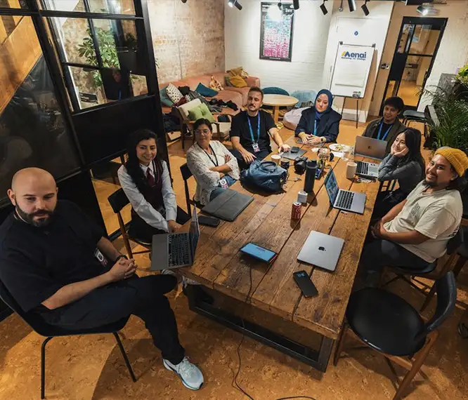 A team taking part in a practical AI workshop