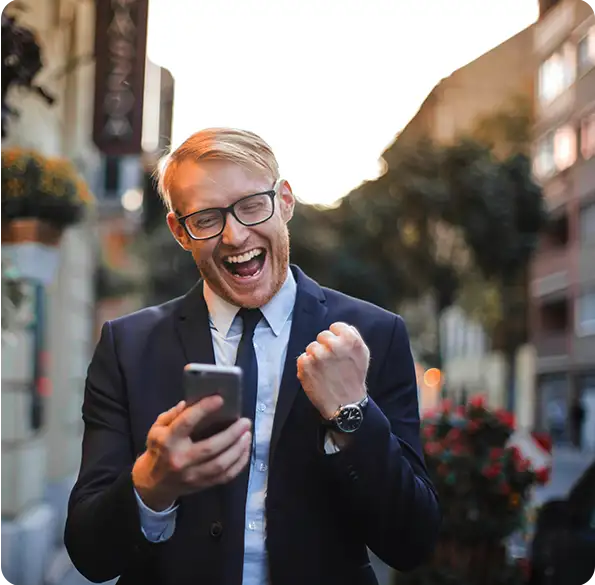 A business owner responding to campaign activity on a mobile phone